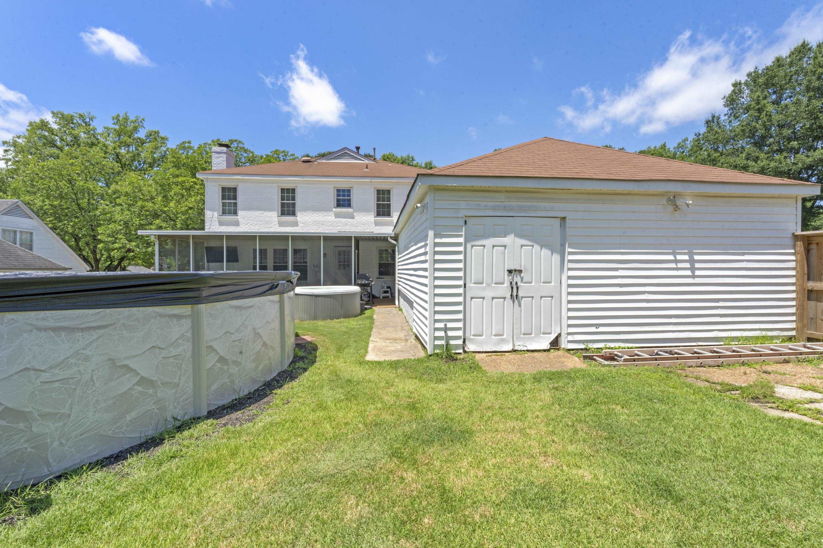 2218 Riverdale Road Germantown, TN 38138 - Photo 35 of 40 This home offers lots of storage space for tools, lawn equipment and more.