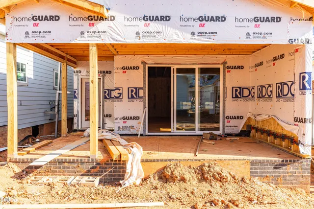 a view of a building with sitting area
