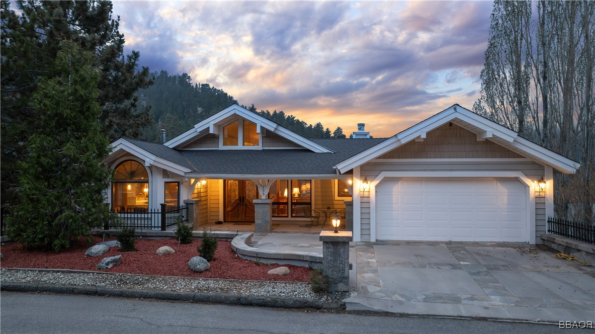 599 Cove Drive Big Bear Lake, CA 92315 - Photo 1 of 50 a front view of house with yard nad seating space