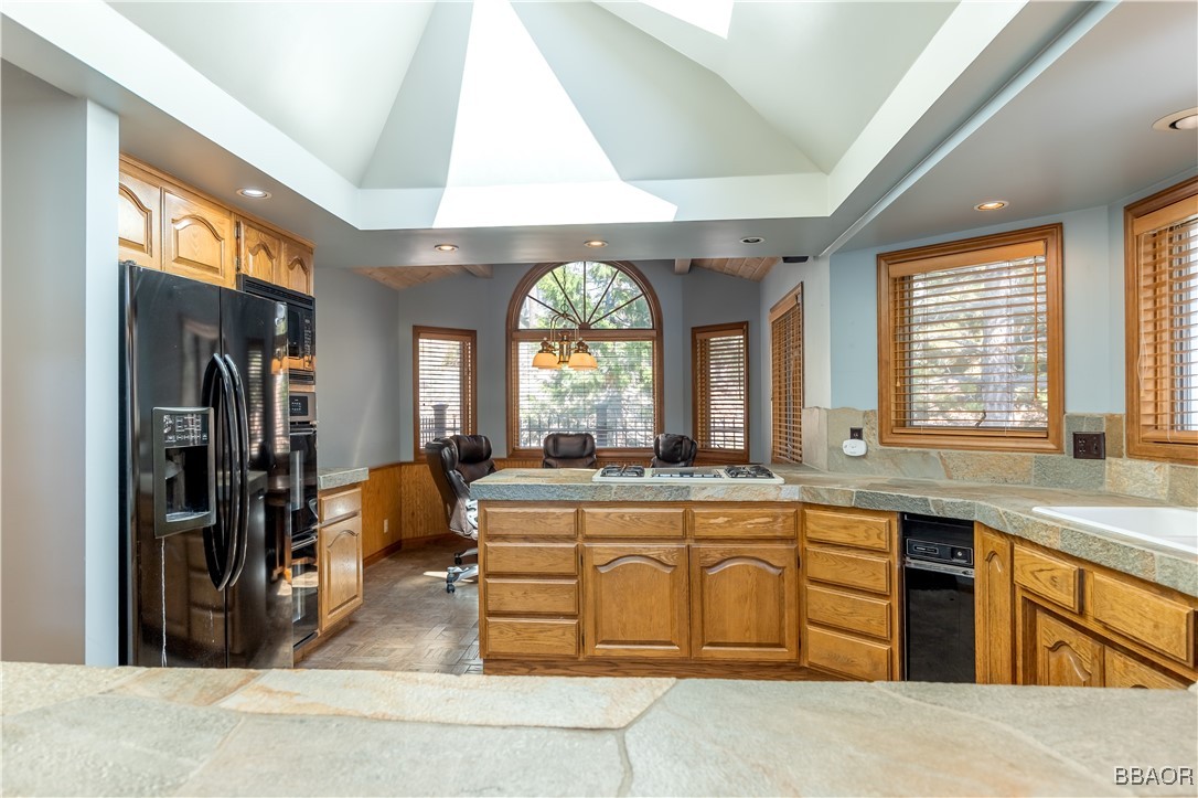 599 Cove Drive Big Bear Lake, CA 92315 - Photo 11 of 50 a large living room with a large window