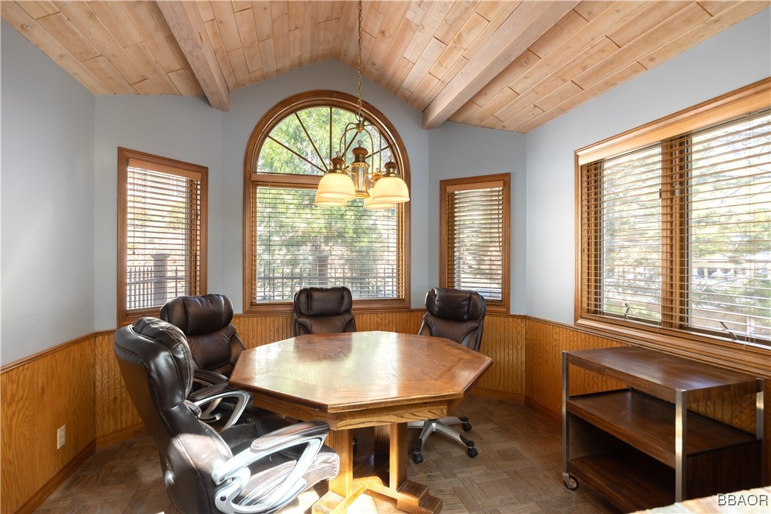 599 Cove Drive Big Bear Lake, CA 92315 - Photo 14 of 50 a view of a dining room with furniture and window