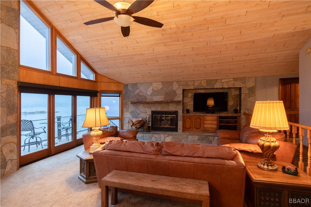 599 Cove Drive Big Bear Lake, CA 92315 - Photo 18 of 50 a outdoor living space with furniture and a fireplace