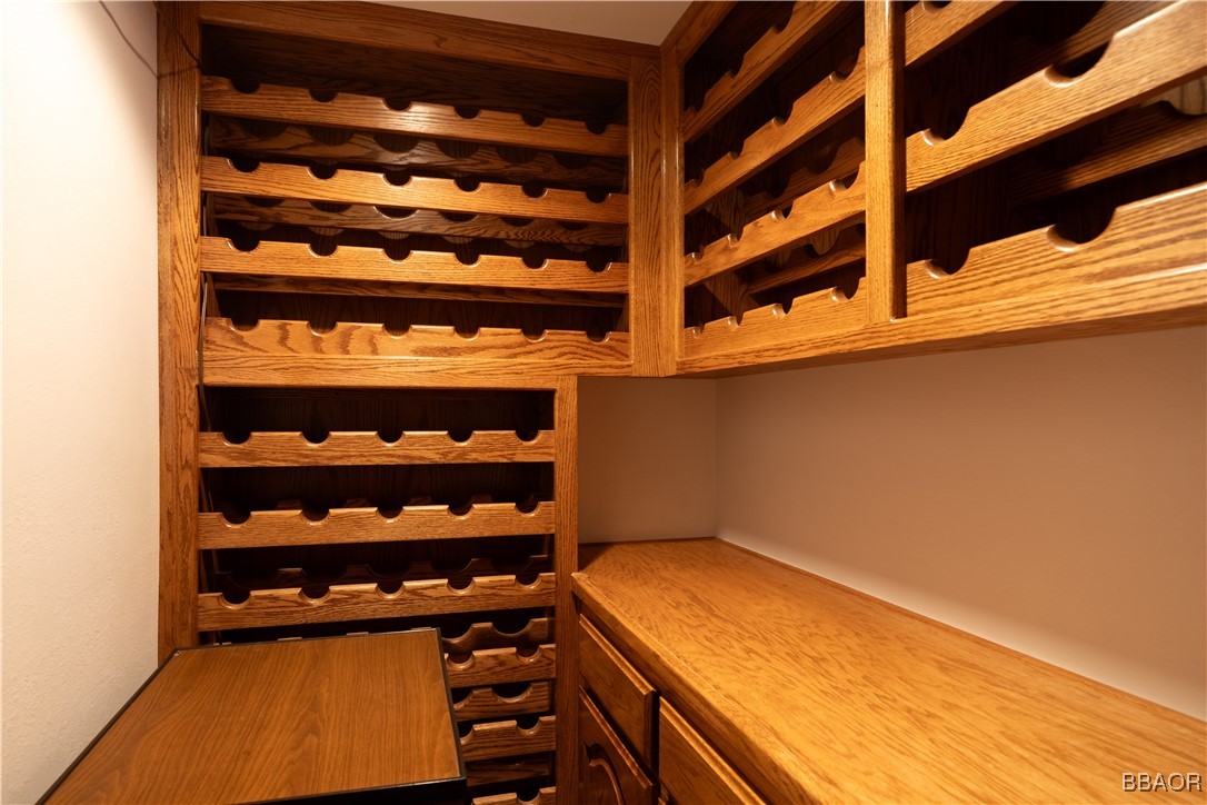 599 Cove Drive Big Bear Lake, CA 92315 - Photo 41 of 50 a view of a room with racks on the wall