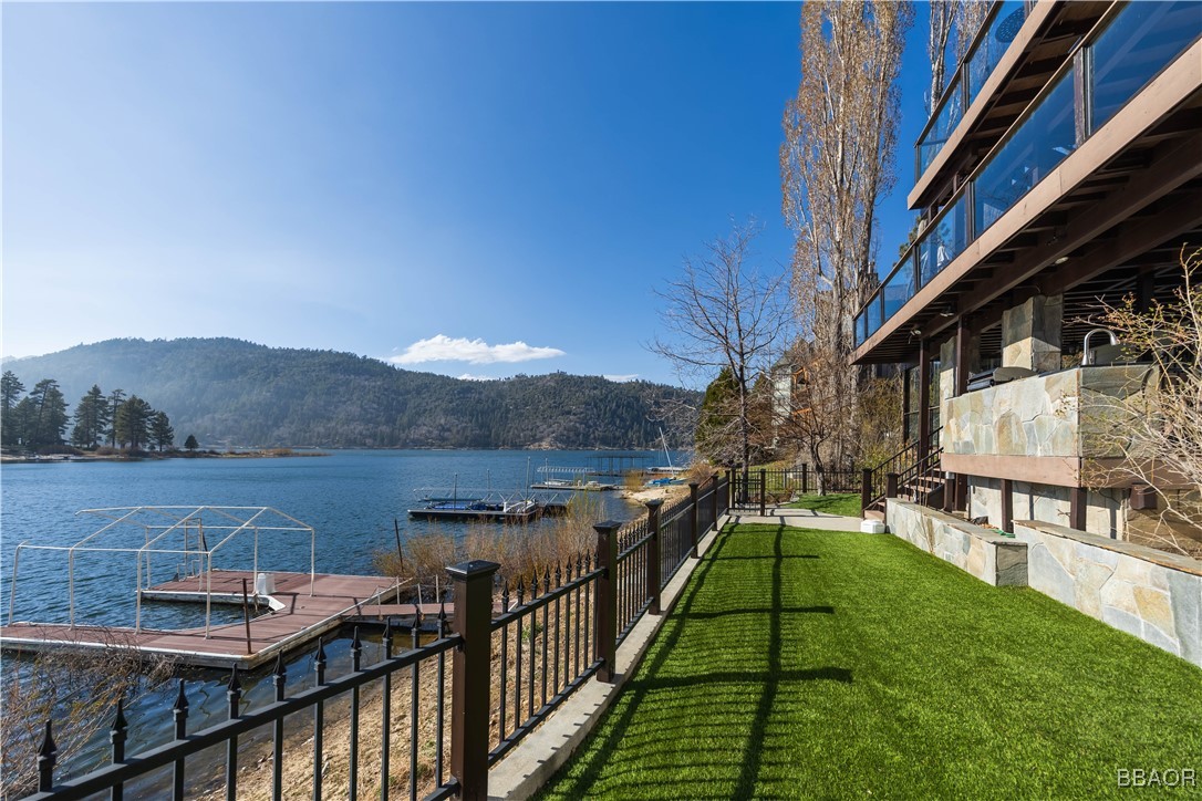 599 Cove Drive Big Bear Lake, CA 92315 - Photo 47 of 50 a view of a balcony with two chairs and a table