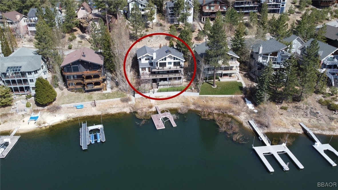 599 Cove Drive Big Bear Lake, CA 92315 - Photo 48 of 50 an aerial view of a house with swimming pool outdoor seating and yard