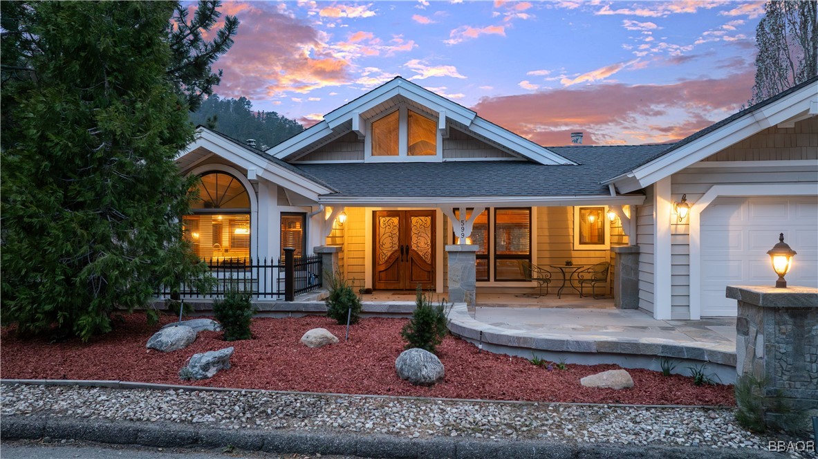 599 Cove Drive Big Bear Lake, CA 92315 - Photo 50 of 50 a front view of a house with garden