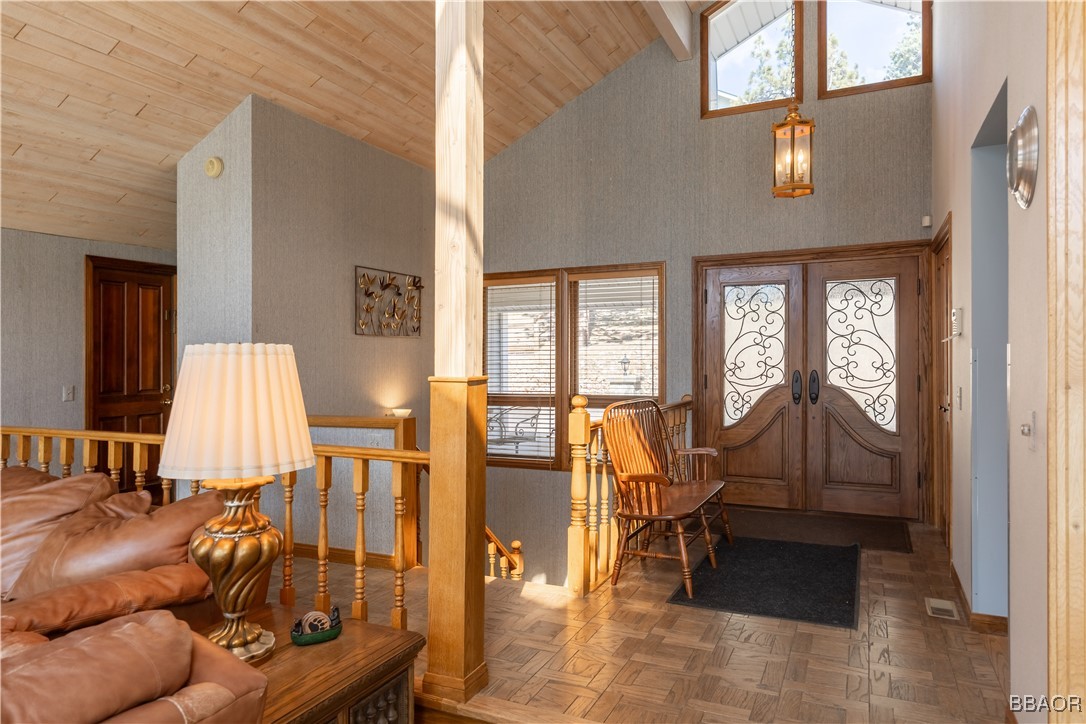 599 Cove Drive Big Bear Lake, CA 92315 - Photo 7 of 50 a living room with furniture and wooden floor
