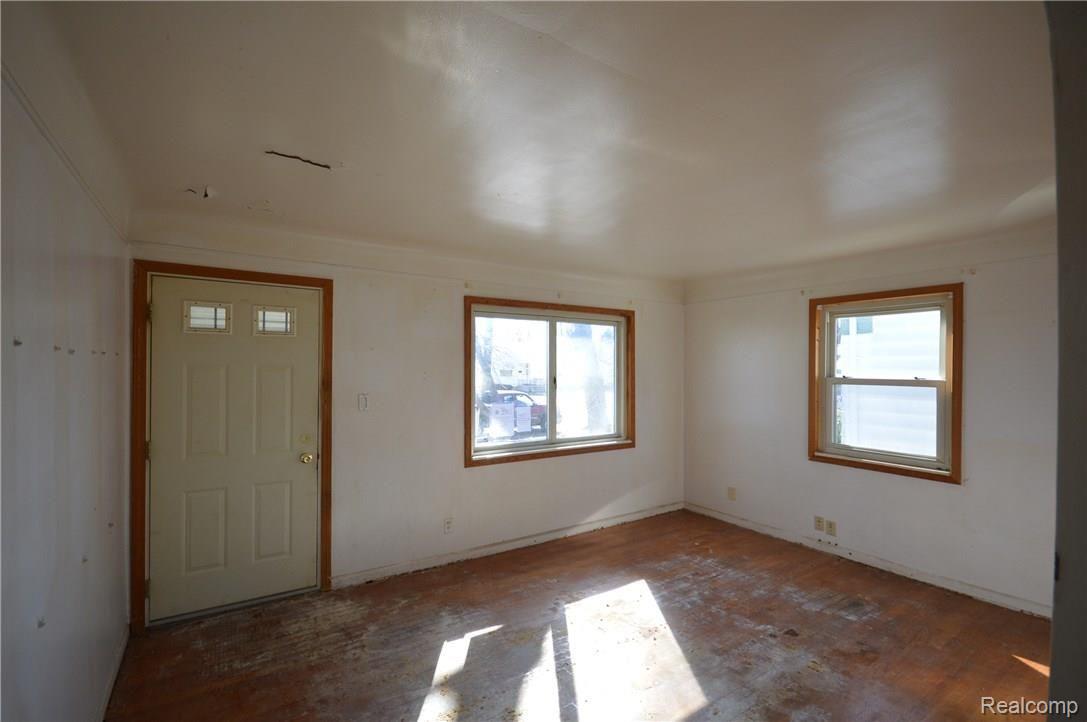 6349 Rutland Street Detroit, MI 48228 - Photo 3 of 10 261-873039_living room view 2.JPG