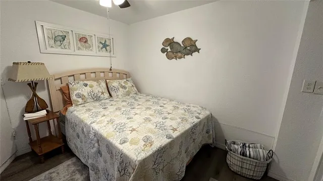 a bed sitting in a bedroom next to a small yard