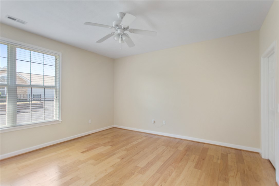 155 Life Style Lane Anderson, SC 29621 - Photo 17 of 49 Bright and airy room with polished hardwood floors, ready for personalization.