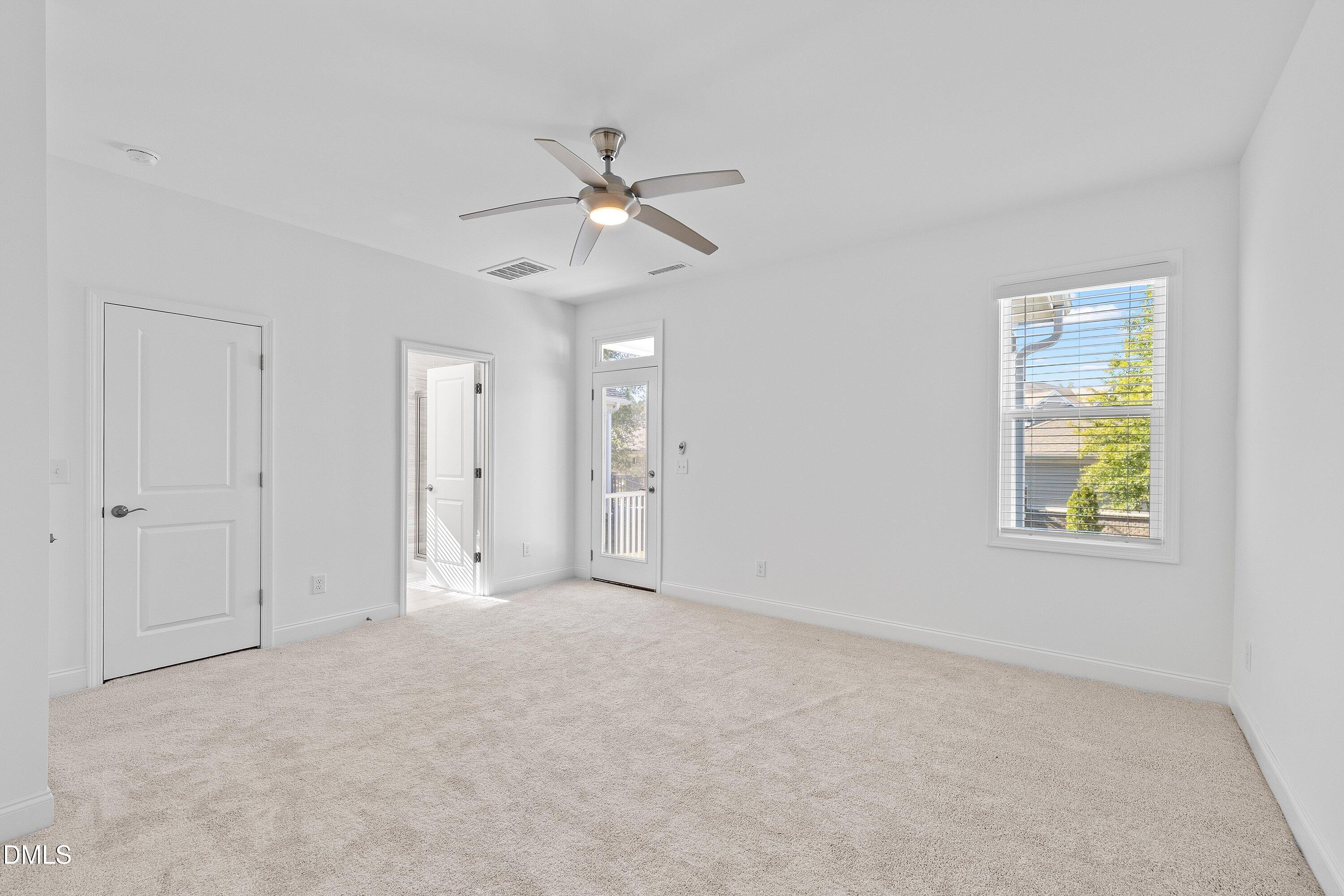 115 Swain Street Clayton, NC 27527 - Photo 21 of 46 a view of an empty room with a window