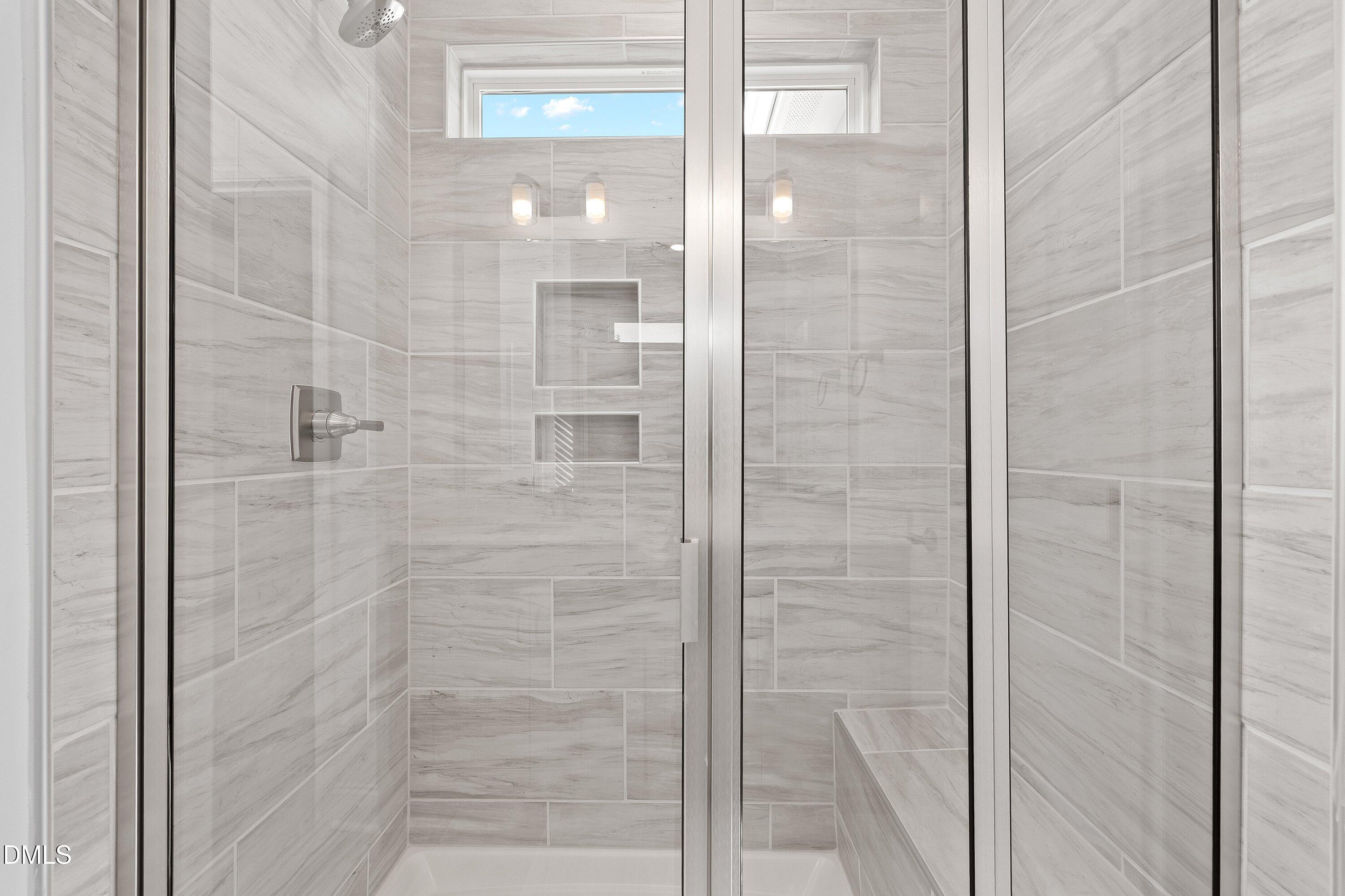 115 Swain Street Clayton, NC 27527 - Photo 26 of 46 a bathroom with a shower