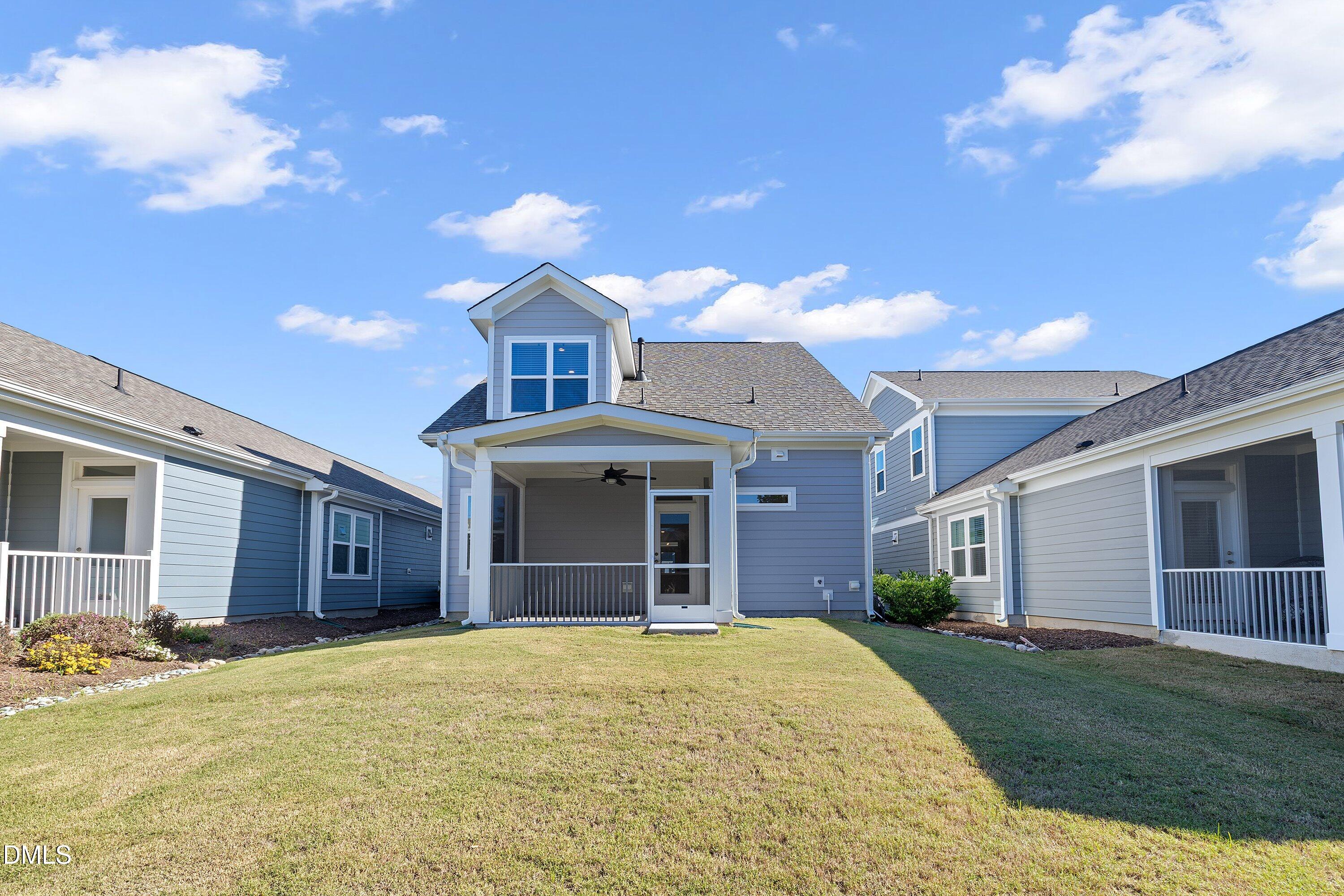 115 Swain Street Clayton, NC 27527 - Photo 35 of 46 a front view of a house with a garden