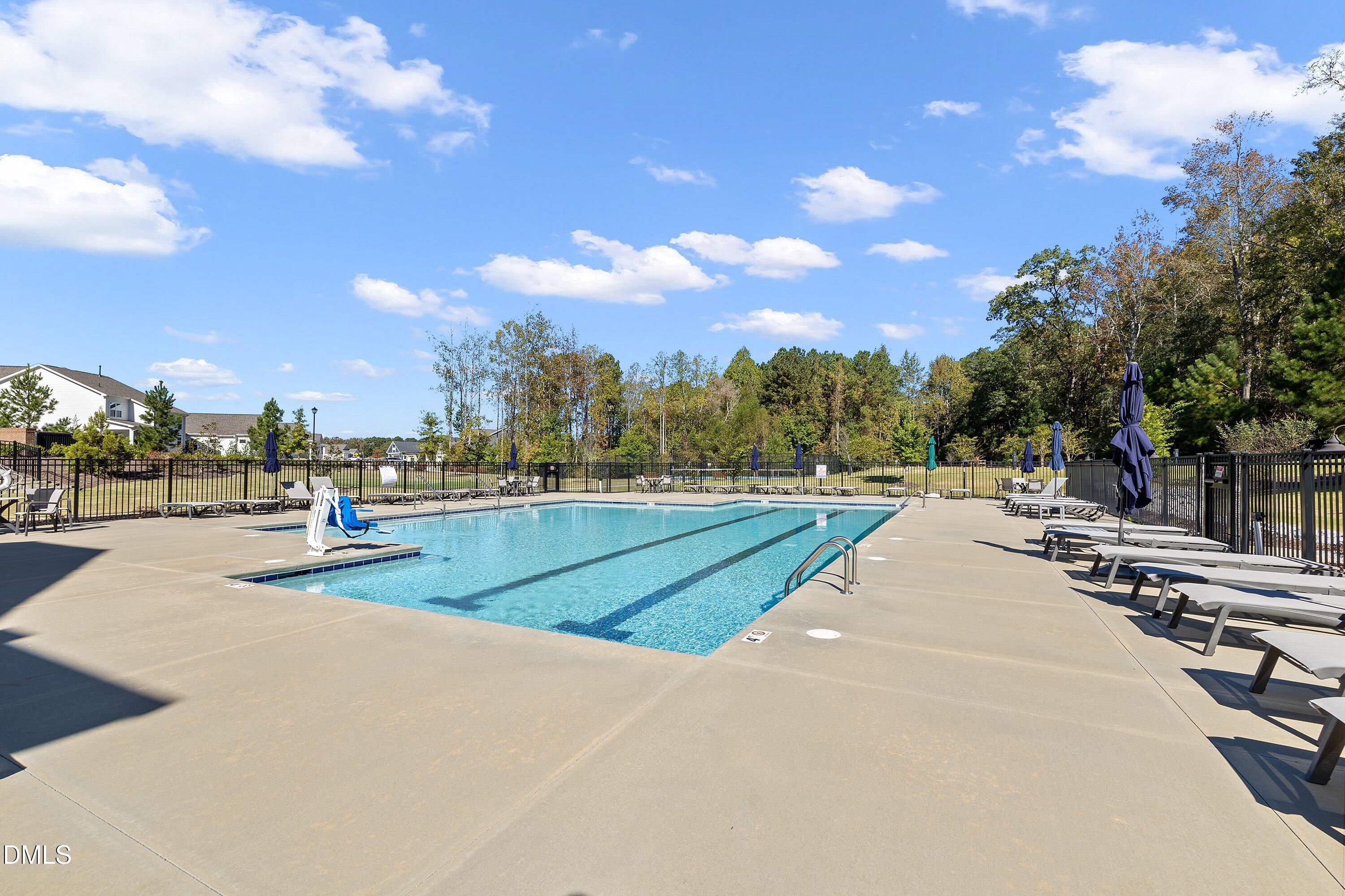 115 Swain Street Clayton, NC 27527 - Photo 43 of 46 a view of outdoor space with swimming pool and furniture