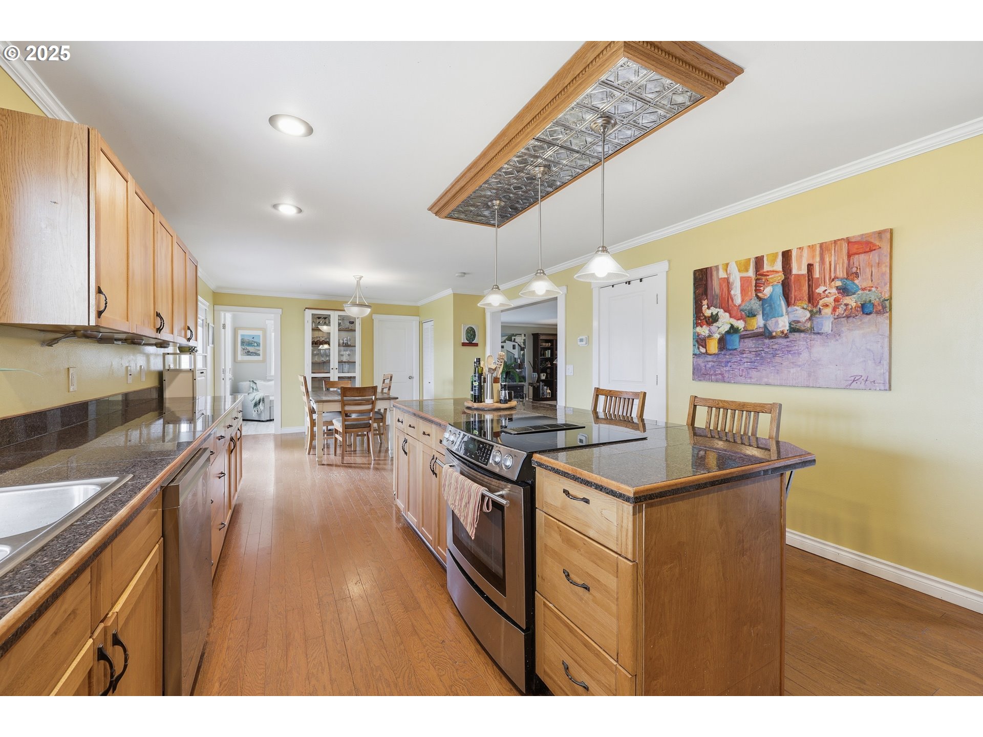 54472 Smock Road Tygh Valley, OR 97063 - Photo 14 of 48 a kitchen with stainless steel appliances granite countertop a stove a sink dishwasher and a microwave with wooden floor