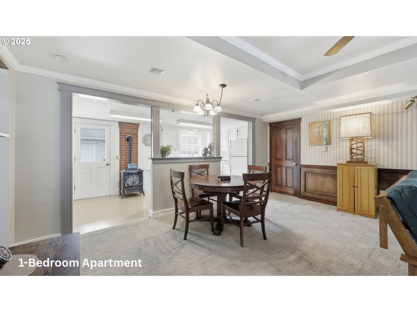 54472 Smock Road Tygh Valley, OR 97063 - Photo 32 of 48 a living room with furniture a dining table and a chandelier