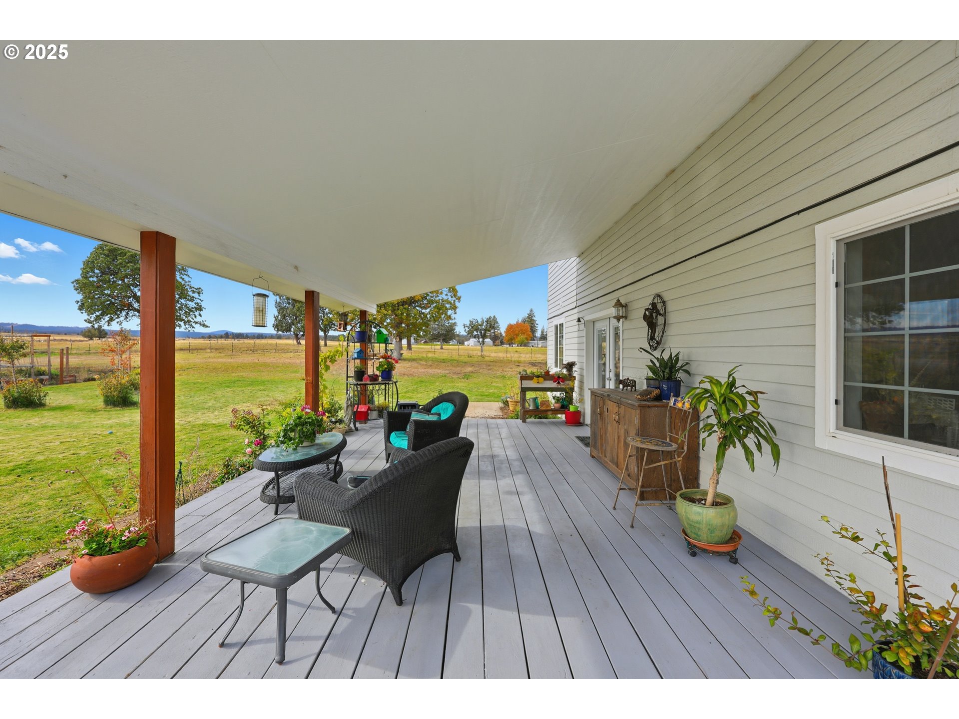 54472 Smock Road Tygh Valley, OR 97063 - Photo 9 of 48 a view of a porch with furniture and garden