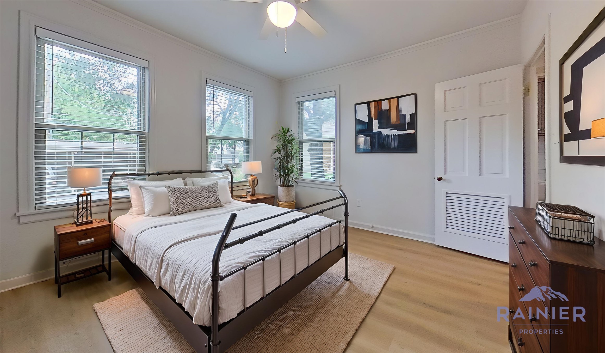1703 Summit View Place, Unit A Austin, TX 78703 - Photo 2 of 13 Virtually Staged: Natural light streams into this serene bedroom, highlighting the smooth flooring and clean lines.
