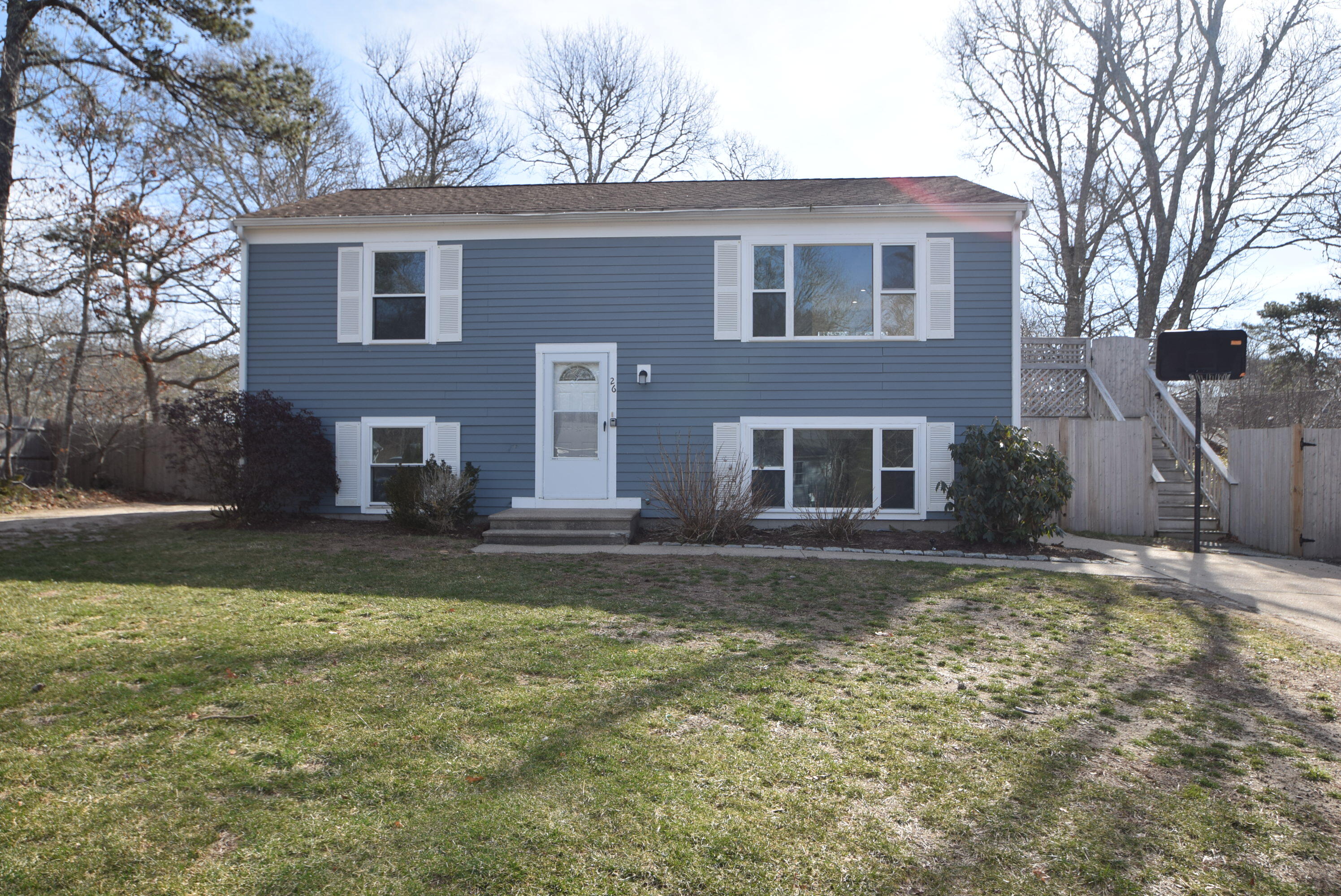26 Ryder Road Harwich, MA 02645 - Photo 1 of 34 a view of a house with a yard