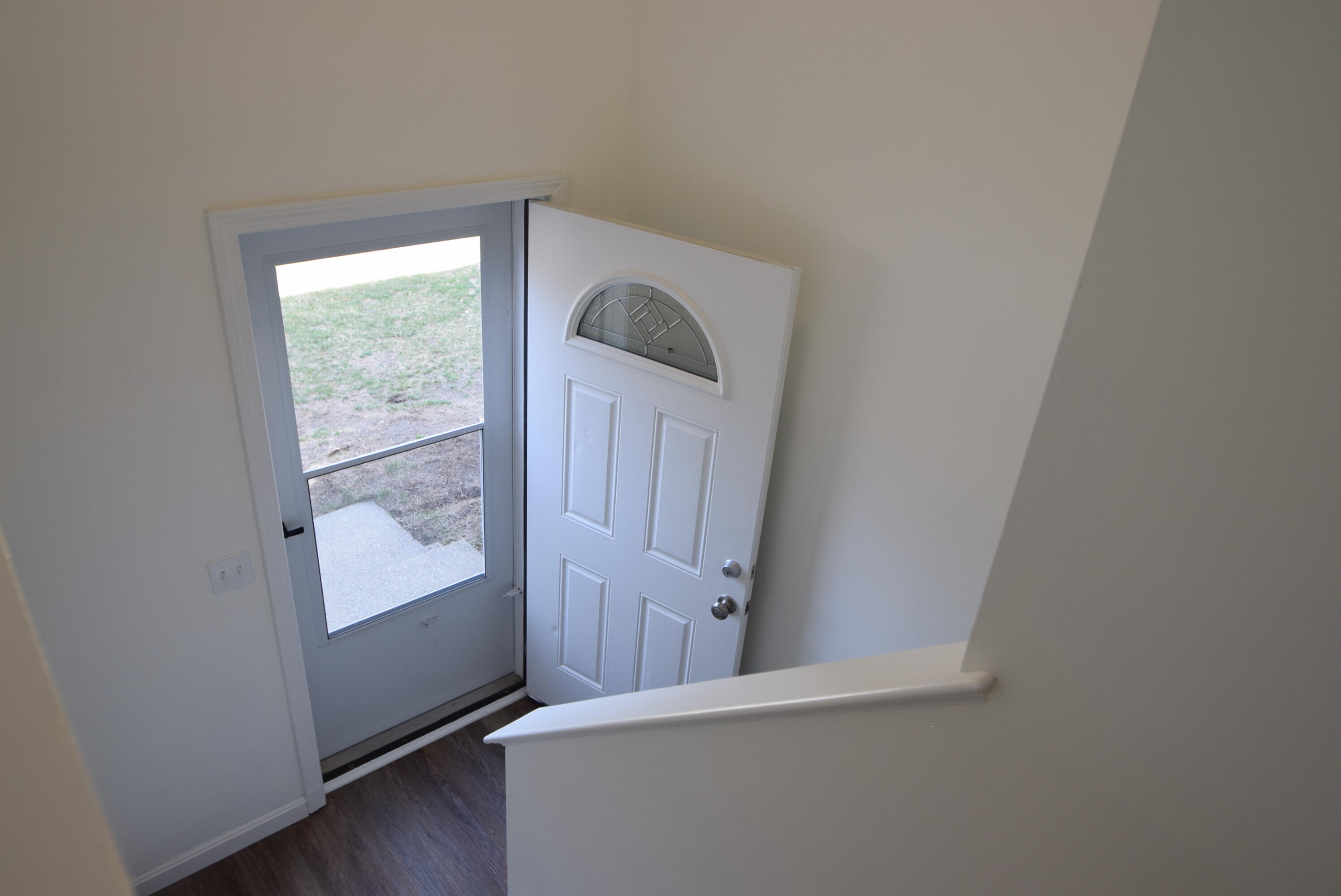 26 Ryder Road Harwich, MA 02645 - Photo 16 of 34 an entryway with wooden floor and cabinet