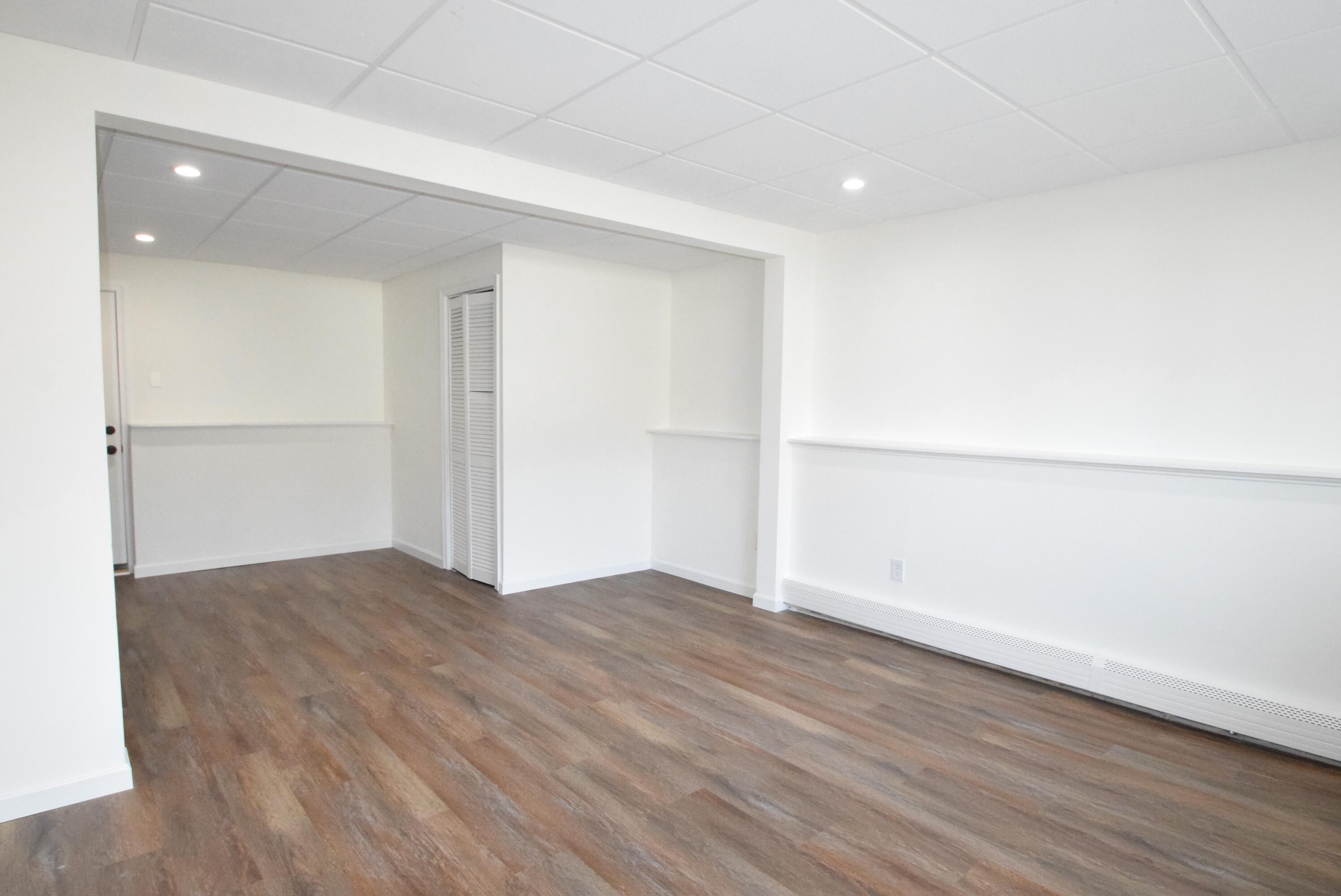 26 Ryder Road Harwich, MA 02645 - Photo 24 of 34 an empty room with wooden floor