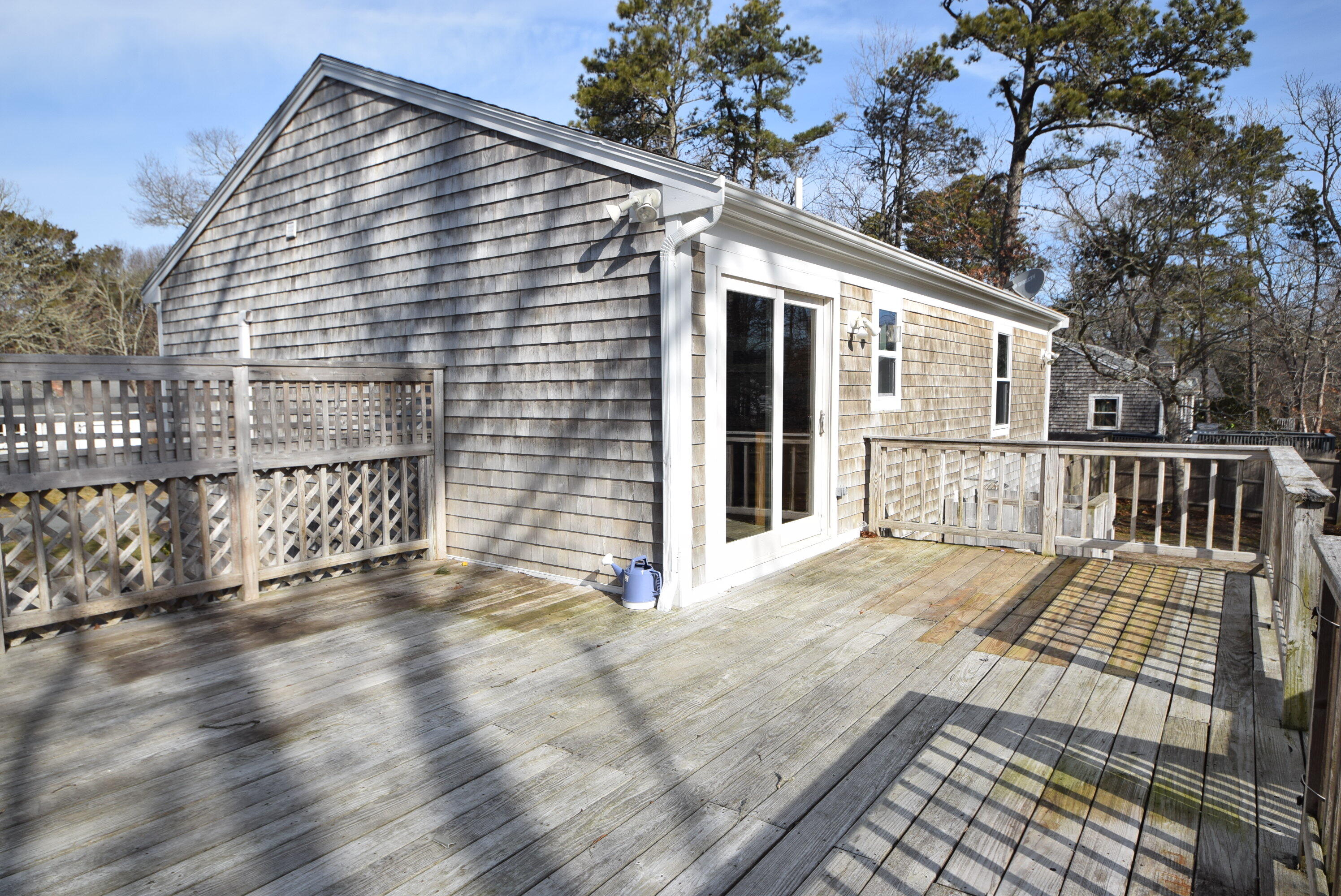 26 Ryder Road Harwich, MA 02645 - Photo 27 of 34 a view of a house with a porch