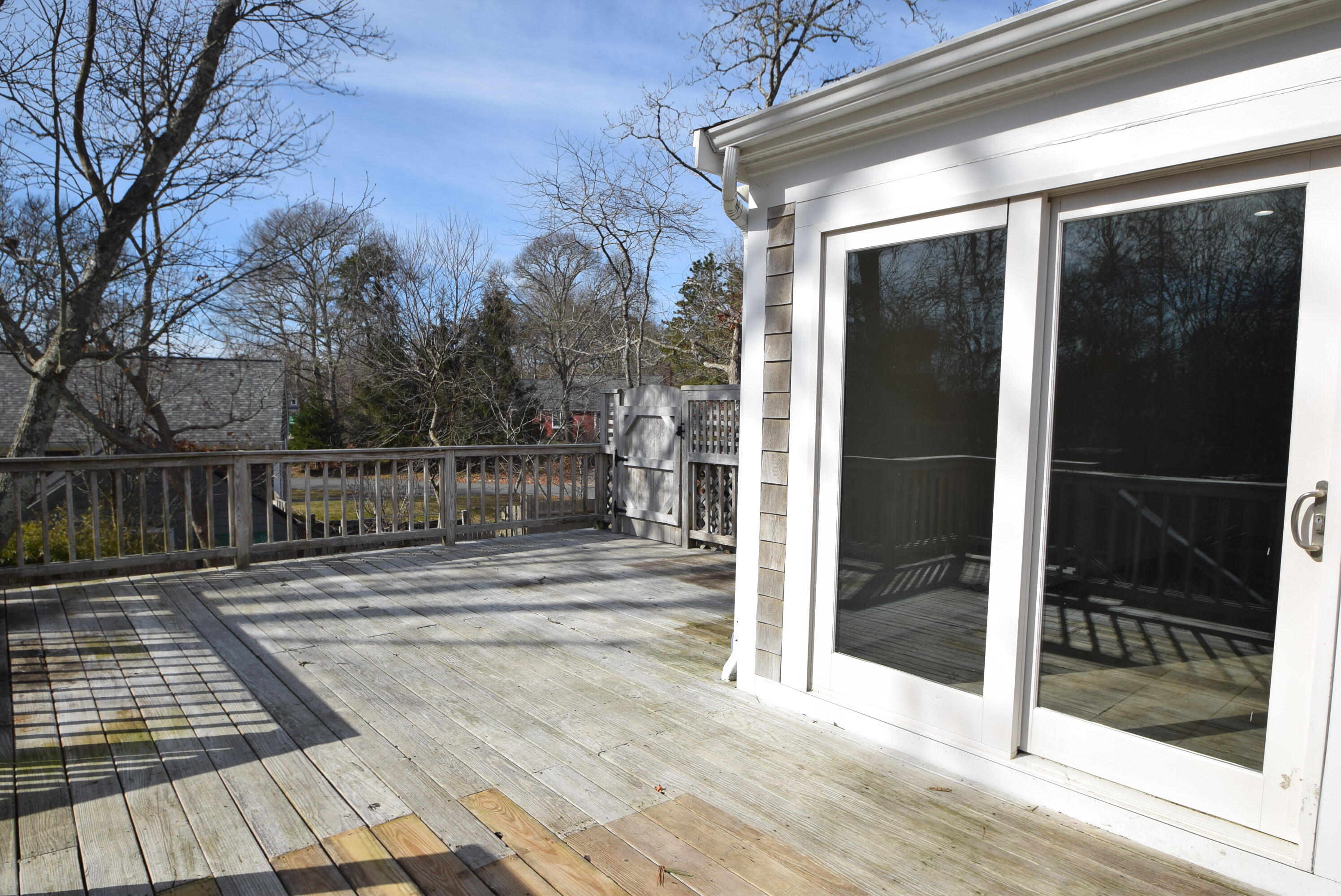 26 Ryder Road Harwich, MA 02645 - Photo 28 of 34 a view of a house with a door and wooden floor