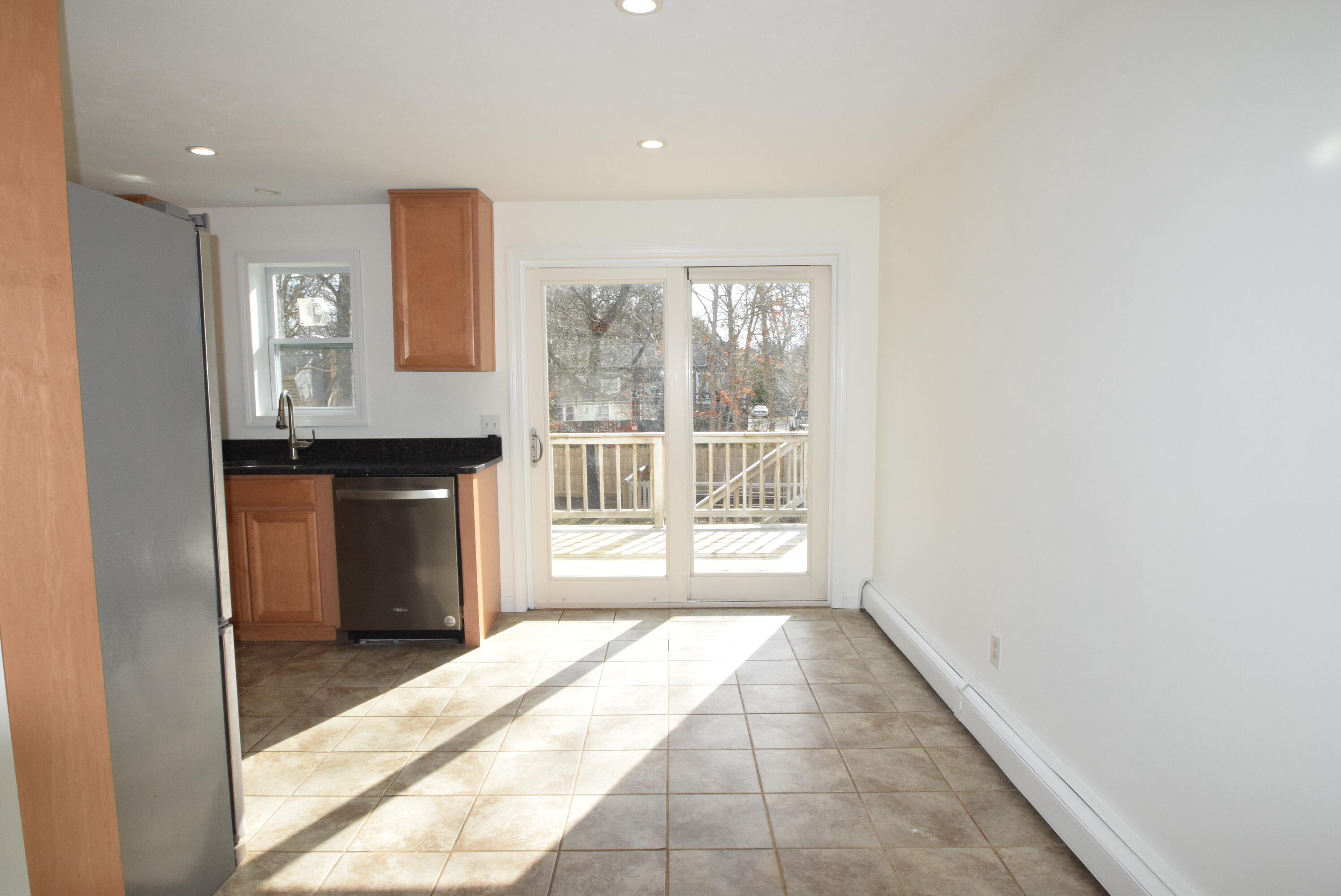 26 Ryder Road Harwich, MA 02645 - Photo 7 of 34 a view of a kitchen with a sink and a window