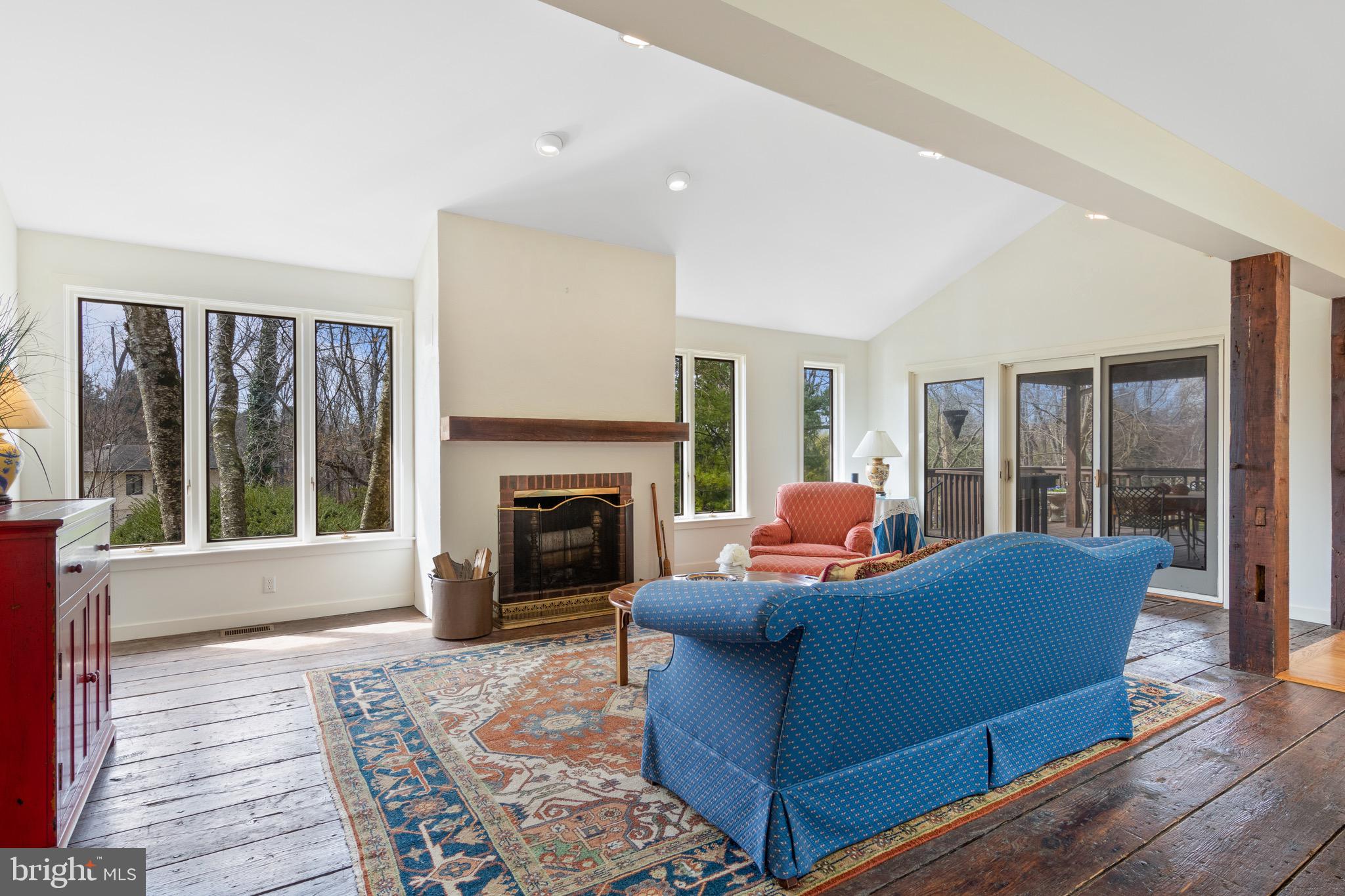 18 Berkshire Drive Wayne, PA 19087 - Photo 17 of 46 Great room has tons of windows and fireplace