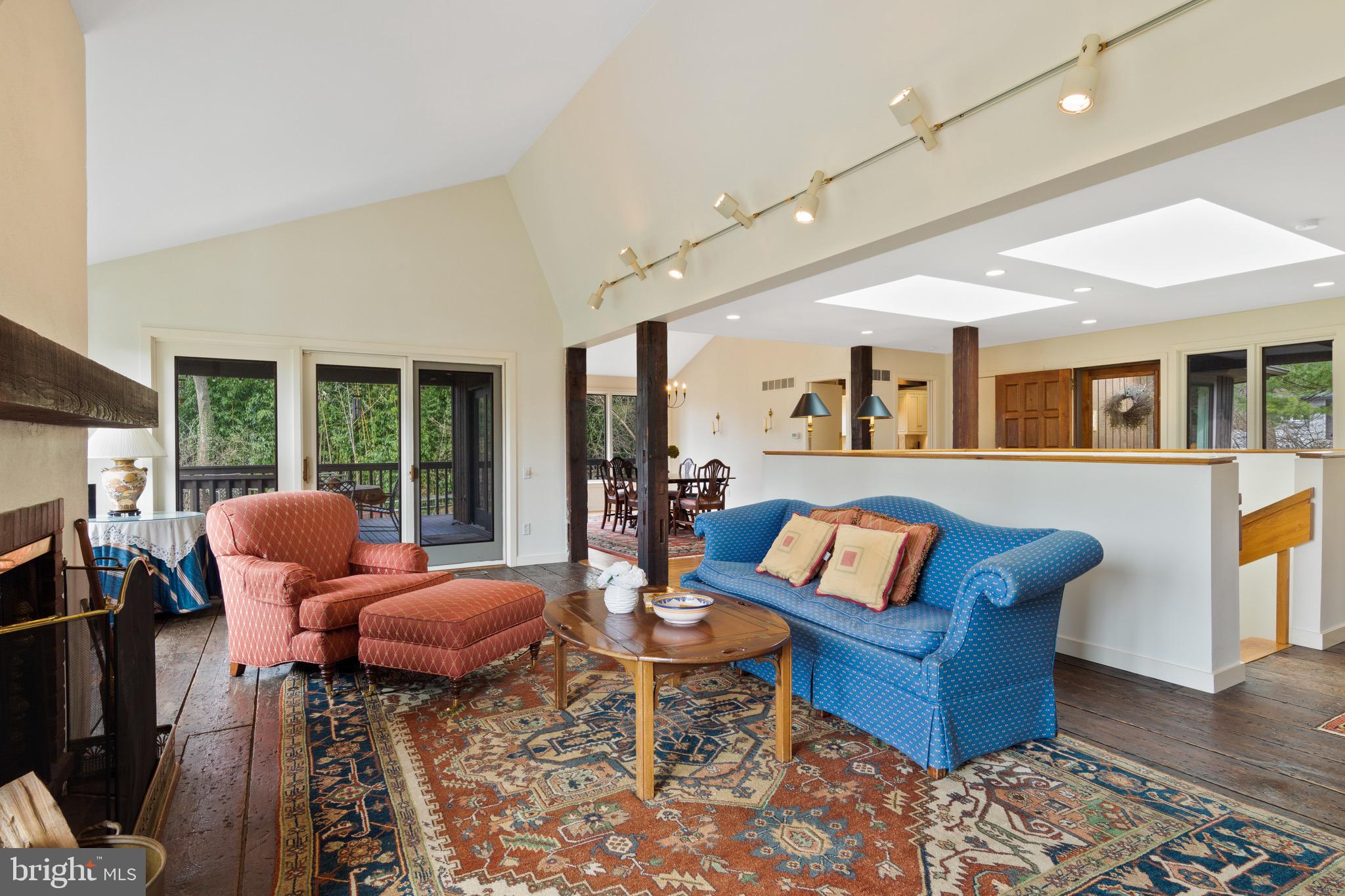 18 Berkshire Drive Wayne, PA 19087 - Photo 18 of 46 Great room with cathedral ceiling and door to deck
