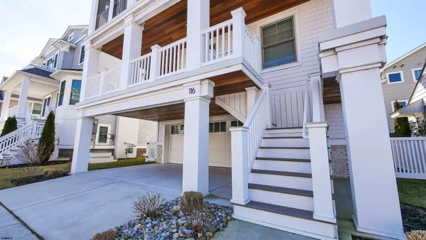 a view of a brick building with many windows
