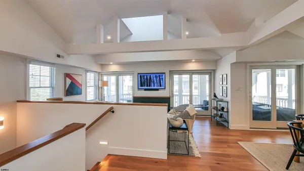a living room with furniture and window
