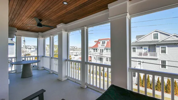 a view of a porch with furniture