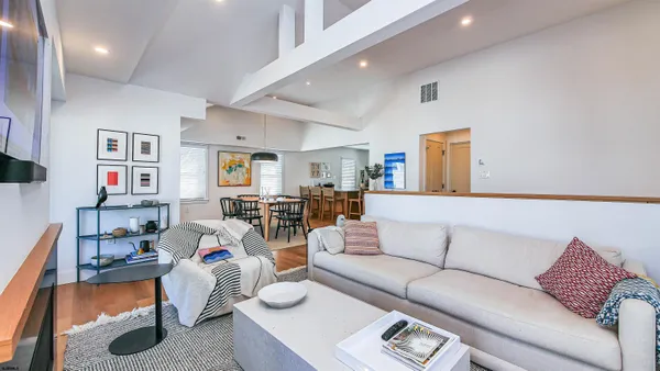 a living room with furniture and a couch