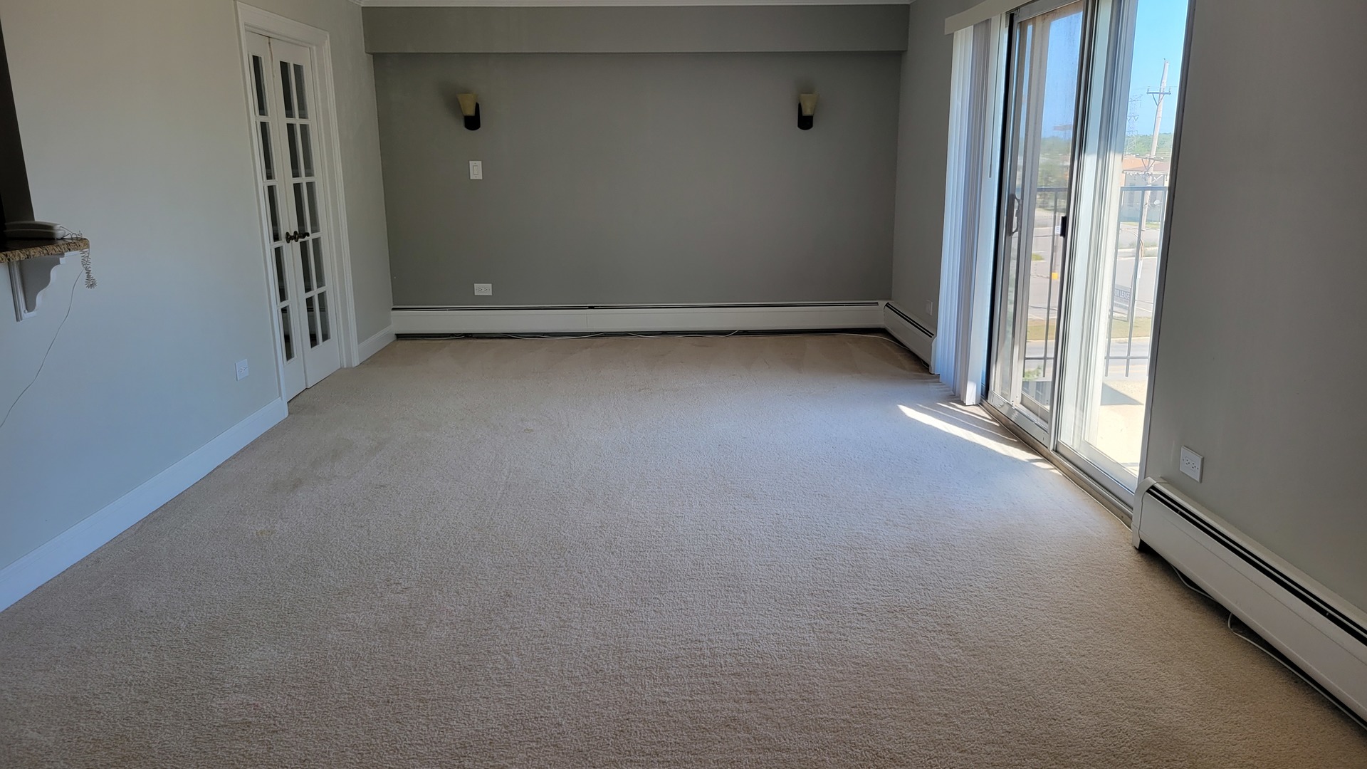 9001 West Golf Road, Unit 4B Des Plaines, IL 60016 - Photo 3 of 21 wooden floor and window in an empty room