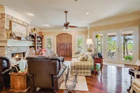 a bedroom with furniture and a chandelier