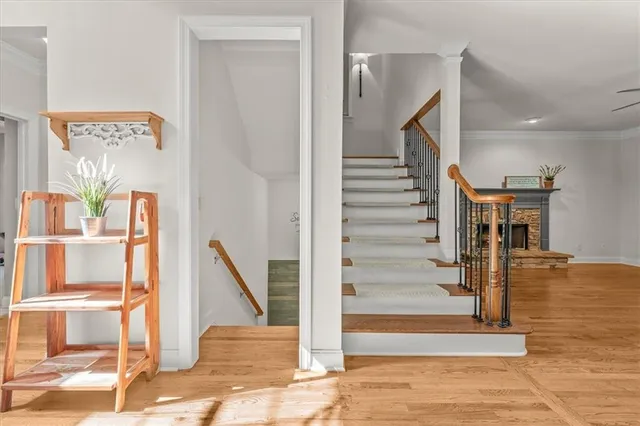 a view of entryway livingroom and hall with wooden floor