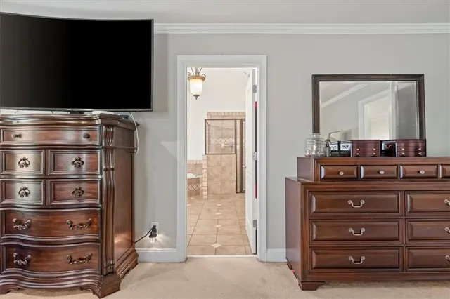 a view of room with wooden floor