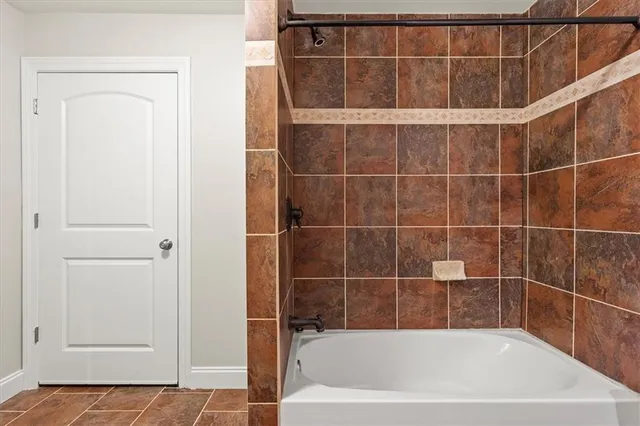 a bathroom with a bathtub