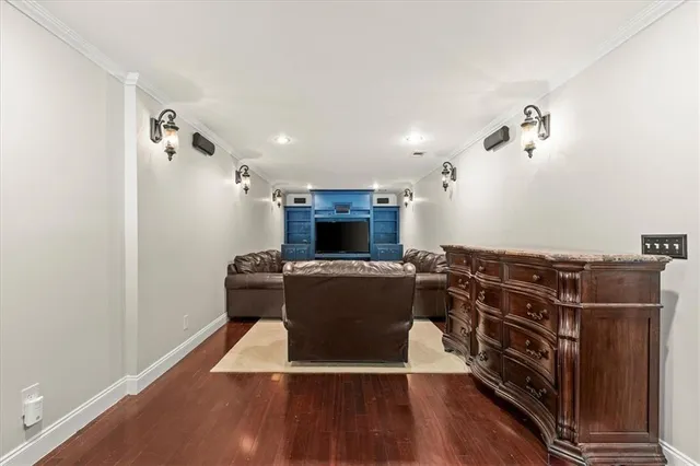a view of balcony with wooden floor and outdoor seating