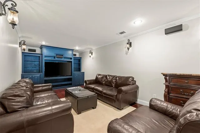 a dining room with furniture and a garden