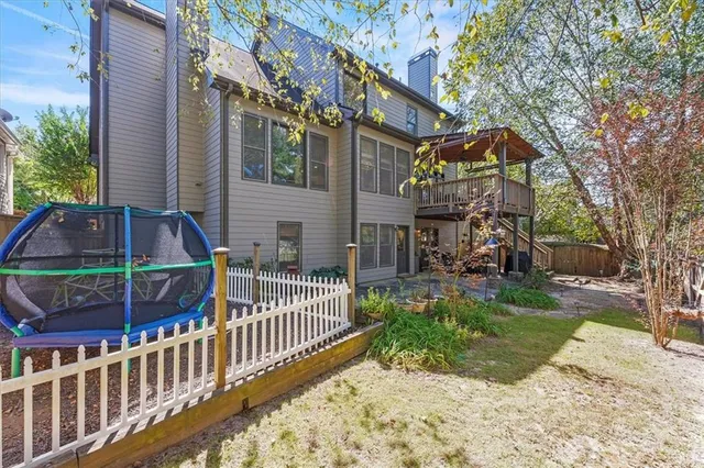a picture of a bathroom with a shower