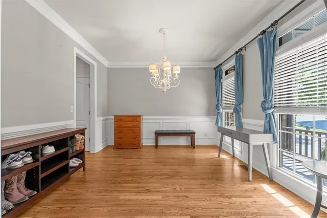 a view of livingroom with furniture wooden floor and window