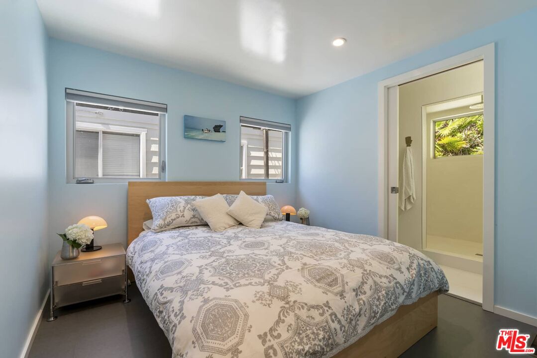 29 Paradise Cove Road Malibu, CA 90265 - Photo 15 of 33 a bedroom with a bed and window