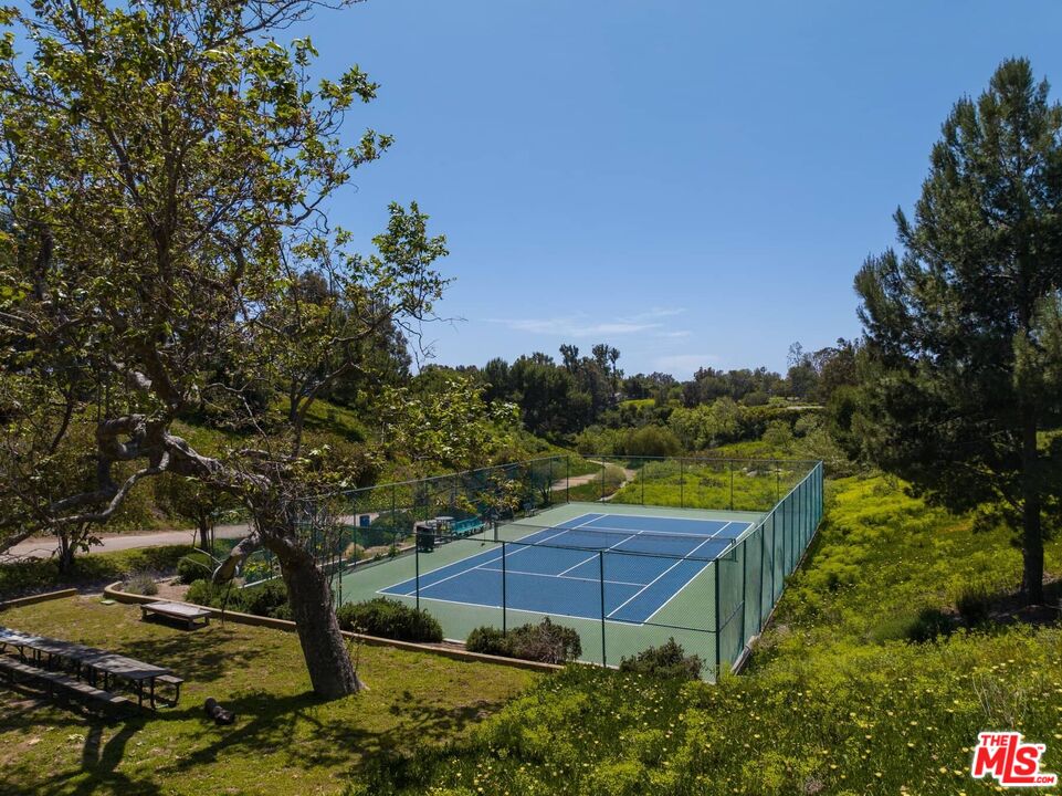 29 Paradise Cove Road Malibu, CA 90265 - Photo 29 of 33 a view of a swimming pool with a yard
