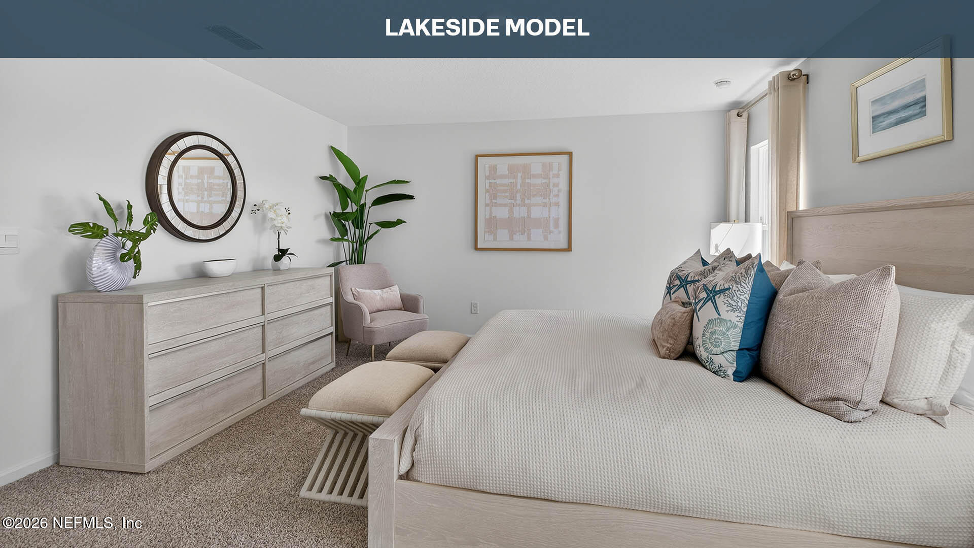 12263 Yew Tree Road Jacksonville, FL 32218 - Photo 15 of 56 a bedroom with a bed a chandelier and dresser