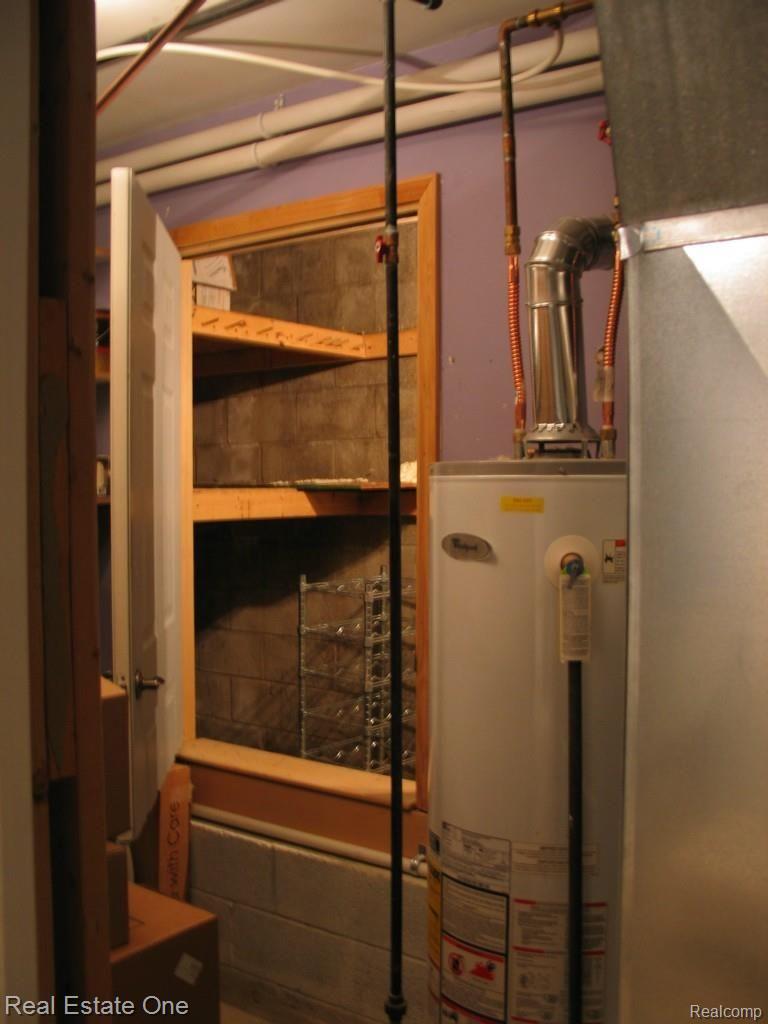 820 Brighton Lake Road Brighton, MI 48116 - Photo 41 of 42 Storage, utilities and wine celler
