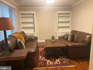338 Dorset Court Doylestown, PA 18901 - Photo 14 of 27 a living room with furniture and a window