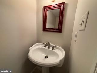 338 Dorset Court Doylestown, PA 18901 - Photo 15 of 27 a bathroom with a sink and a mirror