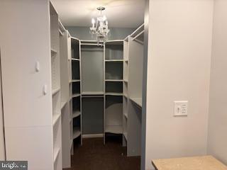 338 Dorset Court Doylestown, PA 18901 - Photo 19 of 27 a view of a hallway with chandelier and entryway